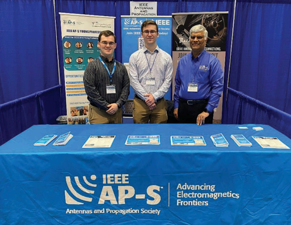 AP-S President Reddy with student volunteers William Goins and Charles Bernhard at IEEE SoutheastCon 2026